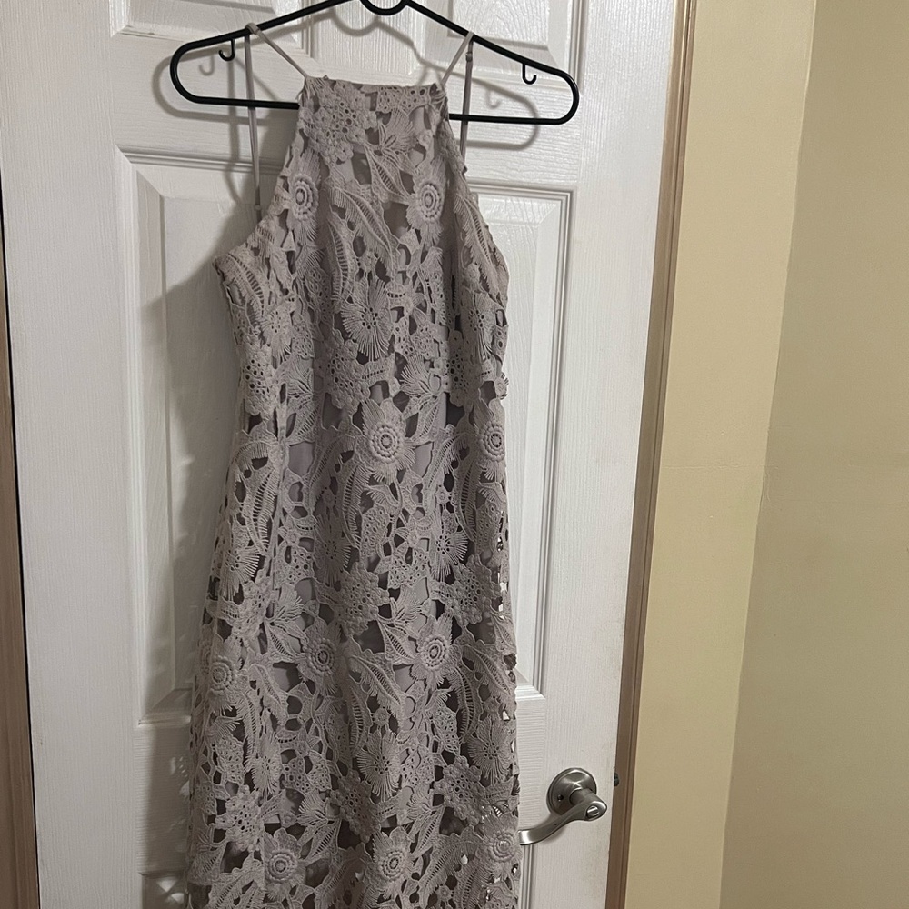 Beautiful guipure beige dress for a wedding